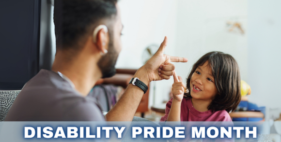 A child doing sign language with an adult who is wearing an ear piece.